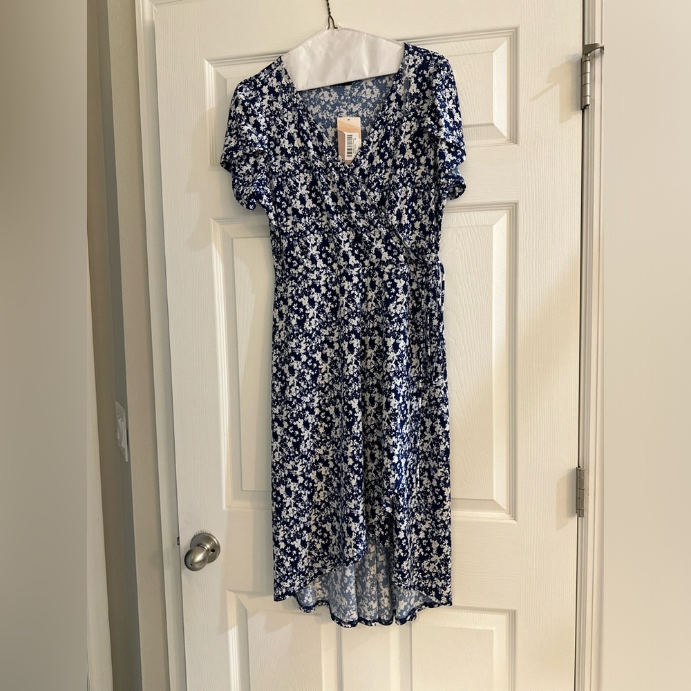 Short story printed wrap dress with scalloped bottom.